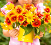 Child and Flowers